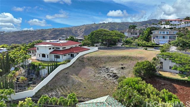 Create your dream home! This gorgeous lot in Hawaii Loa Ridge is double gated and located within The