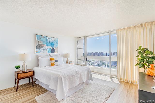 Don't miss this rare chance to secure this clean, move-in ready, 1 bed/ 1 bathroom unit in the heart of town with spectacular ocean/ city/ Diamond Head views.  Also featuring updated kitchen with quartz countertop and permitted washer/ dryer in the unit.  Banyan Tree Plaza now showcases revamped amenities including renovated lobby, pool area, recreation room with kitchen, etc.  This is the unit you have been searching for!