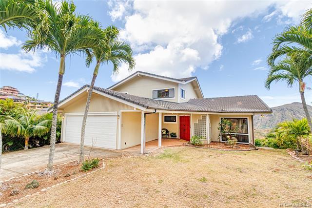 Open Sunday 5/22 from 2-5PM.   Breathtaking views from this perimeter lot home on Mariners Ridge!  This 2 story residence consists of 3 bedrooms, 2.5 baths w/ a large lanai.  There is also a "basement level" outdoor patio area accessible via an interior and exterior staircase. As you enter the home, you will be greeted w/ an open concept floor plan with lots of windows to capture the natural light and cool breezes.   The main level features the kitchen, wet bar, formal dining area, a sunken living room, 1/2 bath, & laundry room.  There are beautiful views from the master suite, a large walk in closet, and a space that could be used as a 2nd walk in closet or maybe even small study.  The master bathroom has been updated and includes a large 