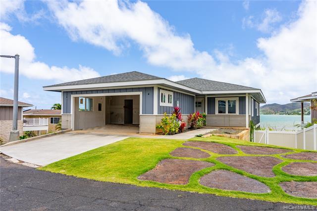 OCEANFRONT HOME! Spectacular ocean, Kaneohe Bay, and Koolau mountain views await you from this waterfront residence in the highly desirable Waikalua Bayside community! The perfect opportunity to turn this 4 bedroom/3.5 bath partially finished property into your dream home! High ceilings, large open floor plan, 2 primary suites, 2 large lanai areas, a double car garage and large picture windows. Easy access to downtown Honolulu, Oahu's military bases, some of the world's best beaches, schools, parks, golf courses and shopping centers. Maintenance fee includes sewer, water, common area electricity, common area plumbing, front yard landscaping maintenance and road maintenance.