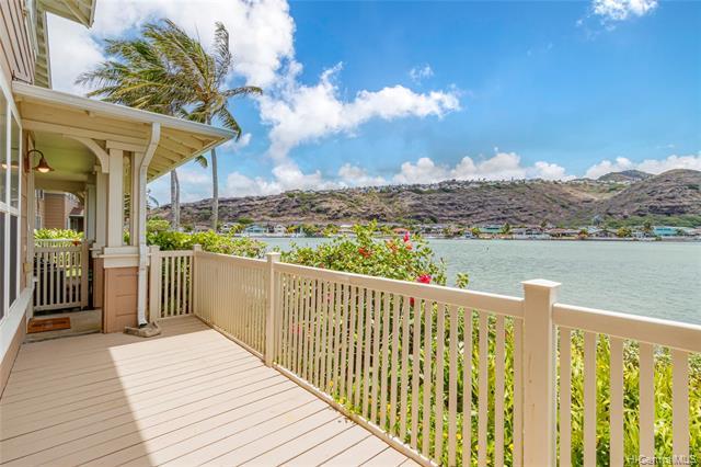 NEW LISTING! Rarely available, WATERFRONT townhome at the Peninsula at Hawaii Kai! This move-in ready 2 bed / 2.5 bath executive residence has beautiful, panoramic marina and mountain views. Sit on the lanai and soak in the sights while enjoying a good book or your morning coffee. This spacious unit features central AC, soaring ceiling and open-floor plan in main living areas, large windows that allow in lots of natural light. Kitchen includes granite counters, custom cabinetry and stainless appliances with newer fridge. 2 parking including a 1-car garage plus an open stall. Pet-friendly community with lots of guest parking, security and resort-like amenities including BBQ area, pool, fitness center, club house, playground, walking path and