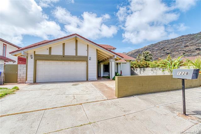 NEW LISTING! Enjoy serene mountain views and cool breezes from this tastefully renovated and nicely maintained 4 bdrm/2.5 bath home with a BONUS 1 bdrm/1 bath in-law’s quarters with separate entry on a LEVEL lot in Kalama Valley. Located in a quiet neighborhood, features include over 2,500 interior sq. ft., vaulted ceilings, and an open kitchen with stainless steel appliances. Conveniently located near parks, beaches, shopping, and restaurants. Don’t miss this fantastic opportunity!