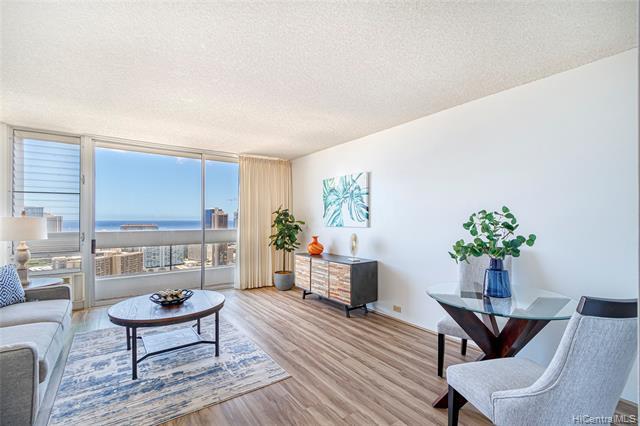 RARELY AVAILABLE! This clean, move-in ready, 1 bed/ 1 bath unit has spectacular ocean, and city views you have to see in person. Featuring open floor plan, NEW microwave hood, NEW bathroom sink, updated kitchen with quartz countertop, and washer/ dryer in the unit.  Enjoy the cool trades that blow through the unit as well as the convenient central location in town. The Banyan Tree Plaza condo now showcases revamped amenities including the pool area, recreation room with kitchen, lounge area, and surfboard storage space. This is the unit you have been searching for!