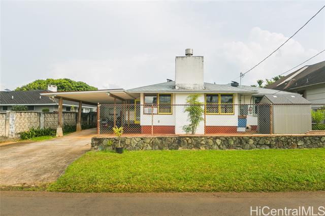 Okay you asked - final price adjustment.  Priced to move - Seller relocating. A must-see Wahiawa Charmer in the Marigold Acres neighborhood.  This open, inviting 3-bedroom, 2-bath floor plan will make a super comfortable space.  This home has a large primary bedroom with an en suite and the fireplace is perfect for those chilly Wahiawa winter nights.  The home has a newer roof and new recessed lighting throughout.  There is a workshop with tons of storage and a substantial open lanai.  24 Owned PV panels can help save on your utility bills.  Enjoy outdoor living with sunset and mountain views on the spacious 8,800 lot + a huge, fenced back yard with many possibilities. Bring your ideas and make it your dream home. Number of bedrooms and bat