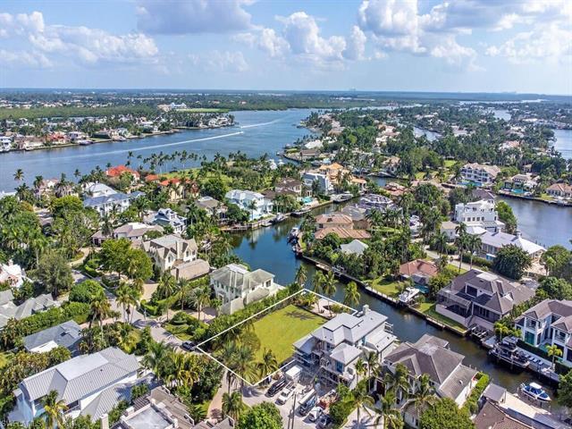 Amidst some of Naples' most exquisite and elegant waterfront homes sits a rare opportunity that offe