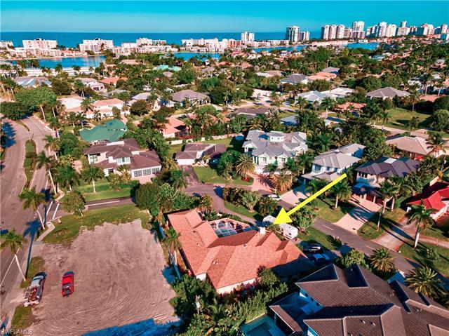 Located LESS THAN one mile to the white sugary sandy beach.  This property is located on an OVERSIZE