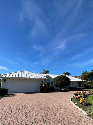 This Southern exposure  4 bedroom, 3 bath pool home has over 2,500 sq. ft. under air and 2,955 sq. f