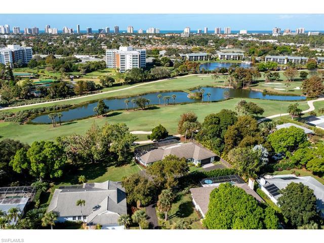 H4449. Newly renovated 2020. Flag lot with 180 degree view of the golf course with a large lake in t