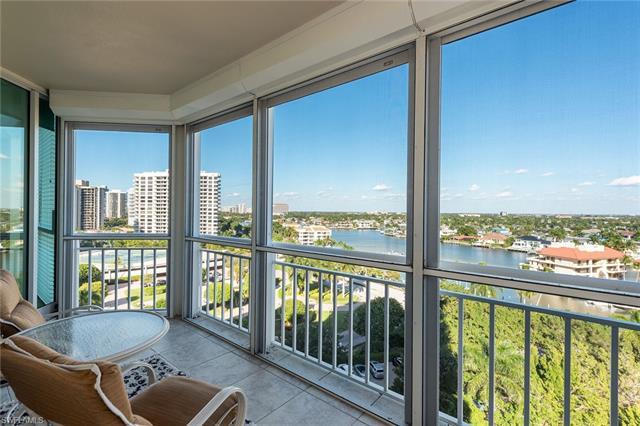 Stunning Venetian Bay, city, and Gulf views await you in this 8th floor remodeled home at Bay Shore 