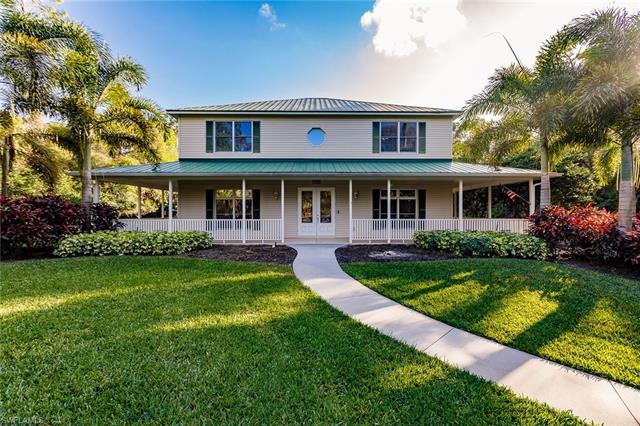 Fabulous Key West Style 2-story pool home on 2.5 acres located in the highly desired Weber Woods are