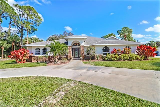 Estate style living in the heart of Naples! Amazing 4 bedroom, 3 bath plus den and 3 car detached ga