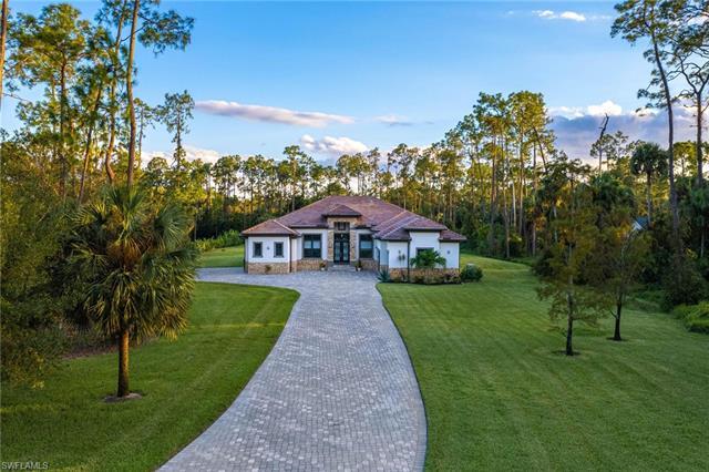 Welcome to a bespoke 2.5 acre Estate in the heart of Collier County - This location features the bes