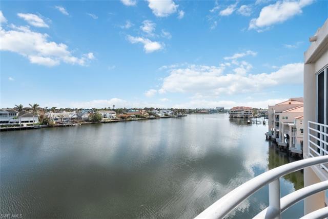 Exceptional opportunity to live on the top floor of this three-story, waterfront condo on fabulous G