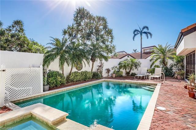 Welcome home to your gorgeous, private, and serene villa located in the heart of Pelican Bay. You wi