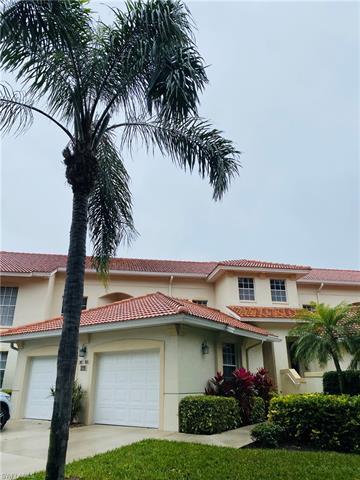 Pelican Marsh, a lushly landscaped, gated community in the heart of North Naples, a pristine, 2nd fl