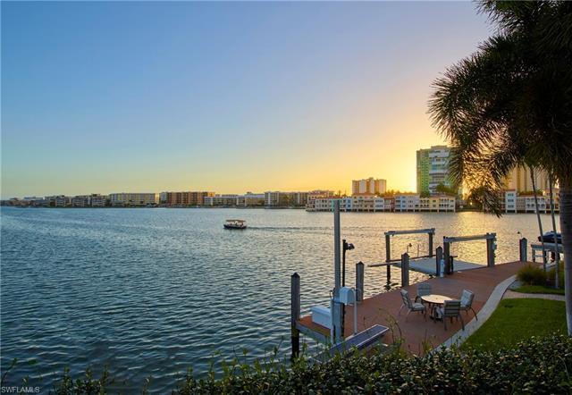 Commanding southwest bay views are panoramic from this spectacular Venetian Bay estate. 
The attrac