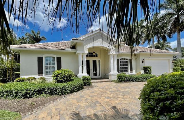 A stylishly updated and elegant home in one of the most desirable locations in The Moorings.  Locate
