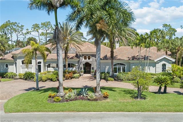 Introducing 5055 Groveland Terrace in prestigious Quail West Golf & Country Club in Naples. Offering