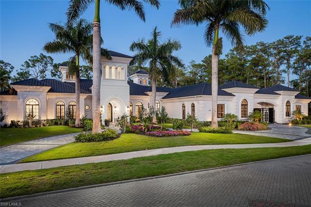 Completely renovated luxury estate offered in Naples’ coveted Quail West community! This masterpiece