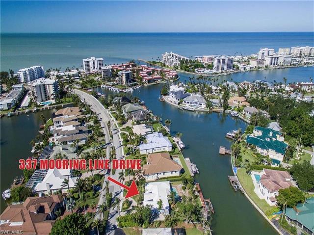 Situated on a highly desirable lot backing up to Bowline Bay, this exceptional property has Gulf acc