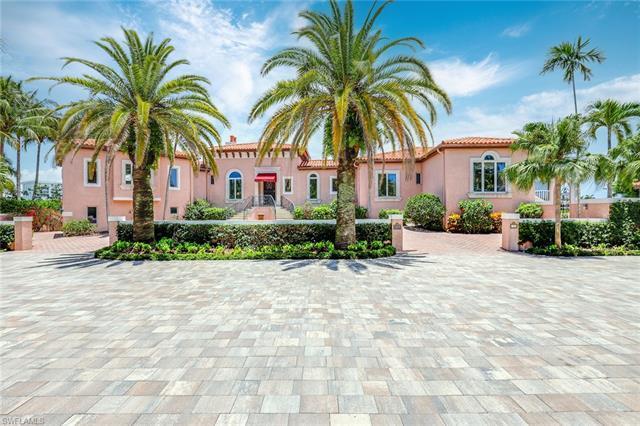 An exceptional and rare opportunity to live on a private island on Venetian Bay in Park Shore. This 