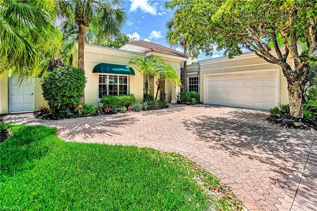 This is a must see updated villa home in The Mews of Naples. There are only thirteen  private reside
