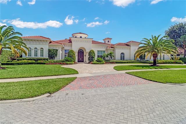 Majestic lakefront estate in Quail West with transferable golf membership & new furnishings is a sho