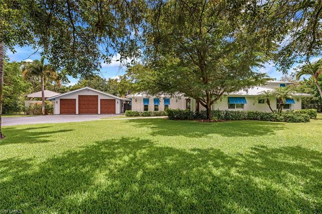Immaculate, fully updated luxury residence on a private one-and-a-half acre homesite in desirable Pi