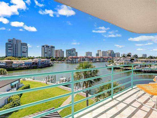 VIEWS! VIEWS! VIEWS! PANORAMIC BAY VIEWS welcome you to this corner unit in Park Shore Landings, one