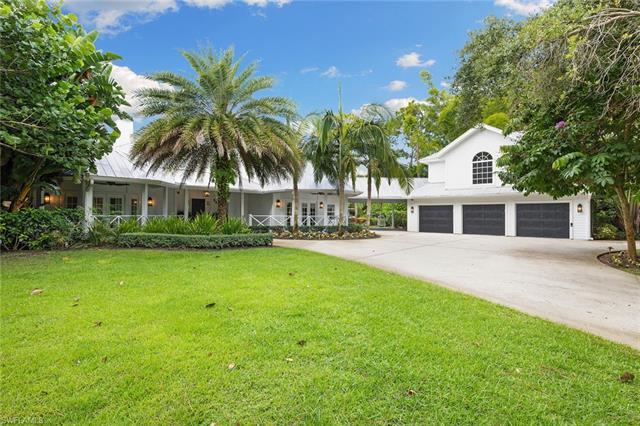Welcome to a serine 1.37-acre estate in the heart of Pine Ridge. The gated circular driveway and mat
