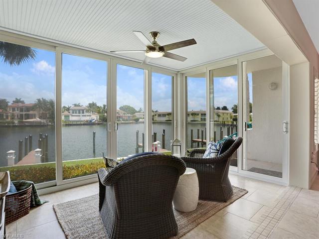 Updated and elegant this coastal inspired BAY front condominium with beautiful water views is now av