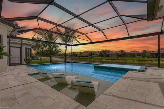 Coveted 5 br/6 bath plus a den Catalina floorplan situated on a Western exposure lake lot. The maste