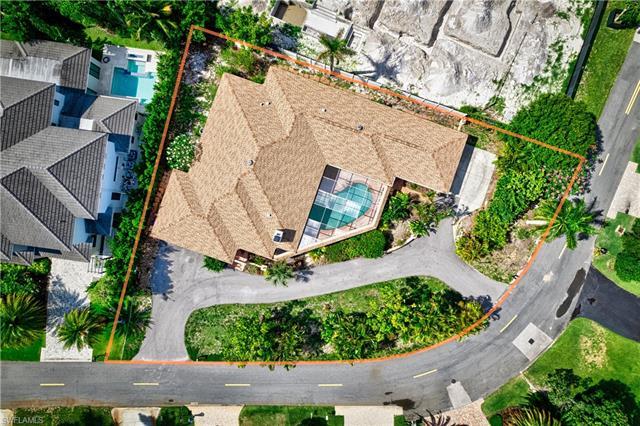 NEWER roof (2019). Located LESS THAN one mile to the white sugary sandy beach. You can WALK to the b