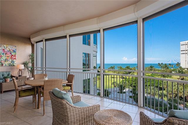 Enjoy beautiful gulf views from this rarely available "05" corner residence in one of Naples most so