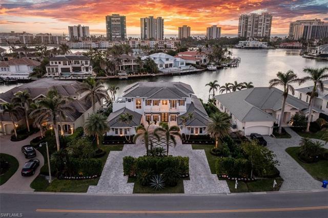 Wide Open-Water Western Views of Glistening Venetian Bay from this Spectacular Reimagined Turn-Key F