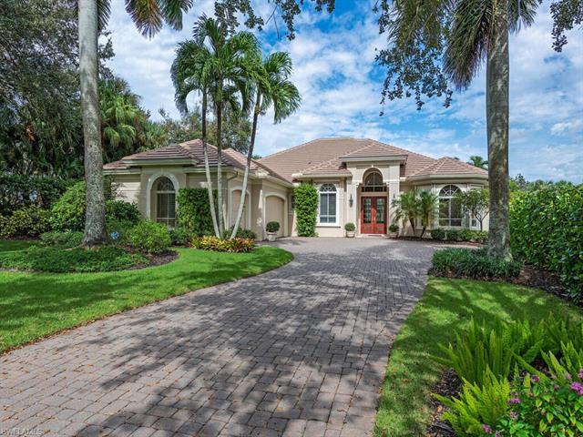 This gracious and immaculate home enjoys fabulous sunsets with golf and lake views. Situated on a la