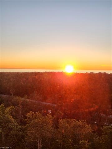 Sunset gulf views from this 6th floor, 3 bedroom, 3 full bath, through view residence.  Walk or tram