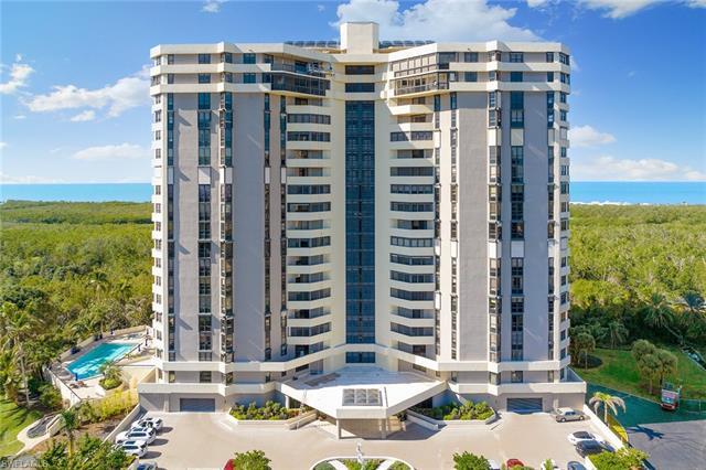 Lowest price per square foot in Pelican Bay high rise. Value! Light, bright southwest exposure end u