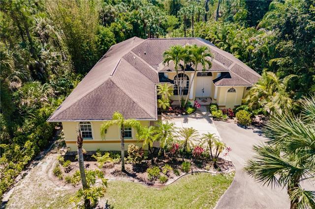 BEAUTIFUL ESTATE POOL HOME WEST OF COLLIER BLVD, ON A 1.14 ACRE LOT WITH SOUTHERN REAR EXPOSURE! A T