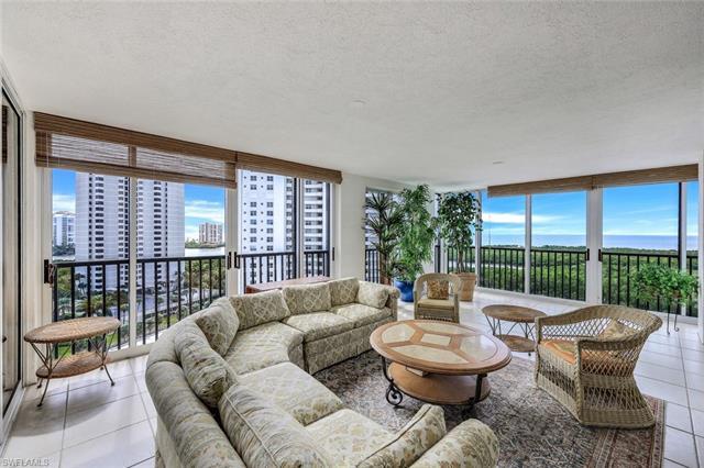 Highly sought after end unit with both Gulf and city views . Boasting a 900 sq ft L shaped lanai lik
