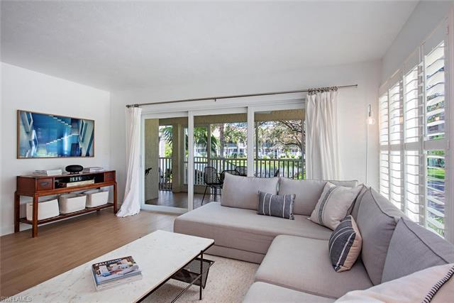 C12019 - A Masterwork! This 3 Bedroom + Den, 2 Full Bath, end-unit residence, has wood-look porcelai