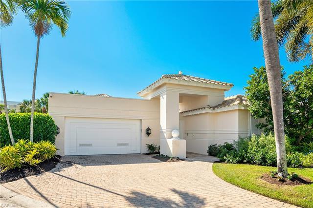Beautiful remodeled home with southern exposure in Pelican Bay. Renovations include three HVAC units
