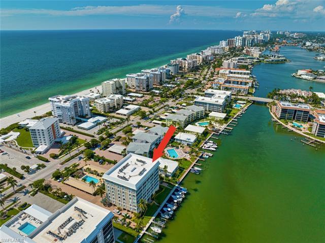 C11743-HUGE, SWEEPING BAY VIEWS through floor-to-ceiling windows & sliders, PLUS GULF VIEW from the 