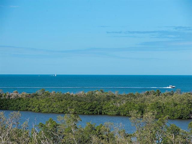 From this spacious and inviting two-bedroom residence, relax and enjoy captivating sunsets into the 