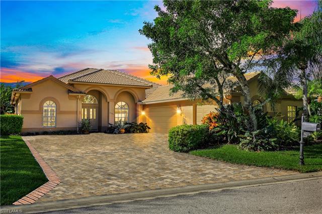 PRICE REDUCED & NEW ROOF TO BE INSTALLED! Nestled within the desired North Naples gated community of