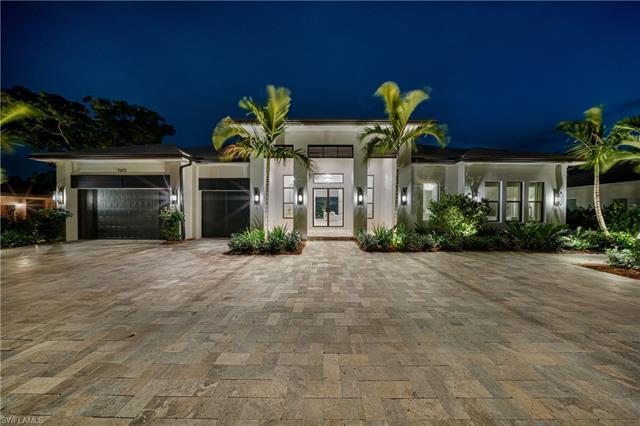Discover unparalleled luxury in this Park Shore masterpiece by PGI Homes. Architectural brilliance m