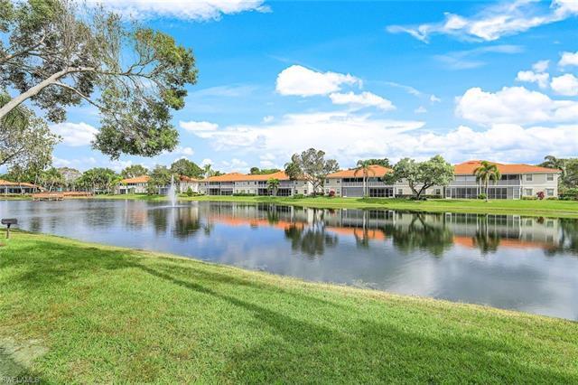 C12861 GREAT LOCATION AND FIRST FLOOR WITH LAKE VIEWS!   Unit is located in the popular Pipers Grove community which is a private, gated community conveniently close to shopping, restaurants, I-75, beaches, library, hospitals and offers walking paths, 3 community pools, bocce ball, tennis courts, club house and workout room.  This 2/2 FIRST FLOOR condo comes with one carport space, tile floors throughout, plantation shutters, and has lake views from the great room and the master bedroom.