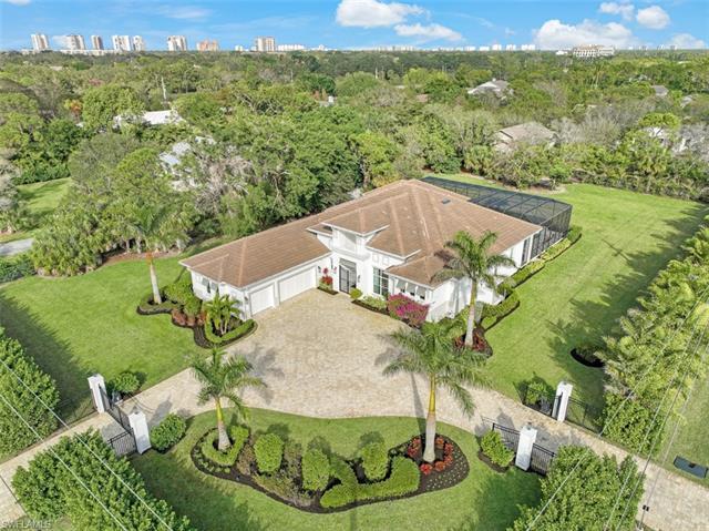 Here is your chance to own the former model home for Stock Custom Homes in Naples’ most sought-after
