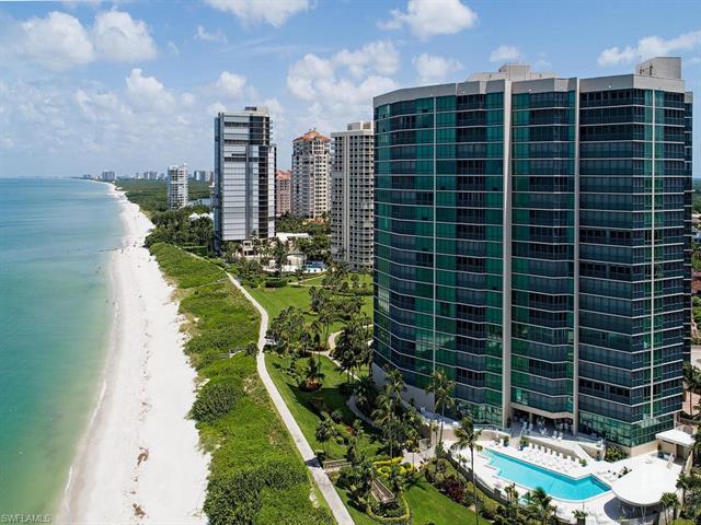 Live the maintenance free high-rise lifestyle just steps from the beach. This delightful condo glows