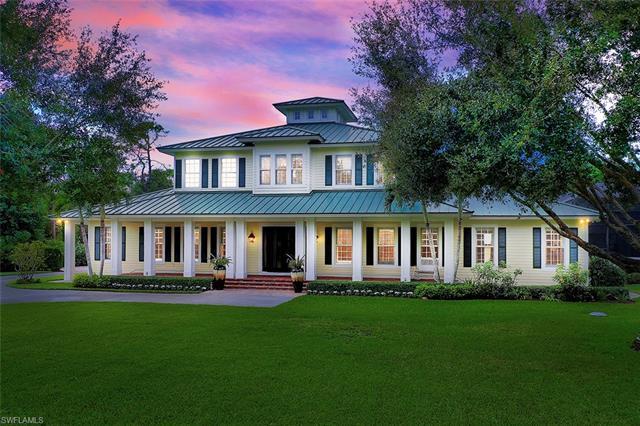 Discover the Olde Florida architecture conveying a casual and relaxing lifestyle on 1.53 acres of tr